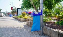 Ayvalık'ta yeni nesil şeffaf çöp potası dönemi başladı