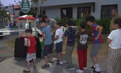Osmangazili çocuklar açık havada 'Efsane Takım Bilim Kahramanları' filmini izledi