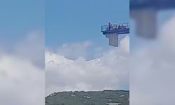 Isparta'da ücretlerini alamadıklarını iddia eden işçiler kule vince çıktı