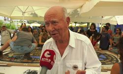 İstanbullular Müze Gazhane'de şehrin 'Nazar Kuşu'nun taşlarını döşedi...Ressam Mustafa Pilevneli: 2-3 aylık bir bebek bile bu taşa elini değdirdi
