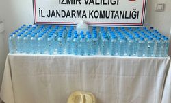 İzmir'de jandarma ekipleri 7 saatlik denetimde 6 bin 989 kişiyi sorguladı, 1085 litre etil alkol ele geçirdi