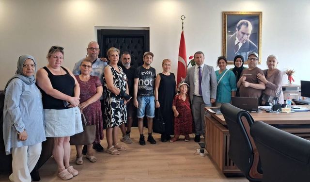 Ayvalık'ta Birlik Ortopedik Engelliler Derneği'nden Kaymakam Çimşit'e ziyaret